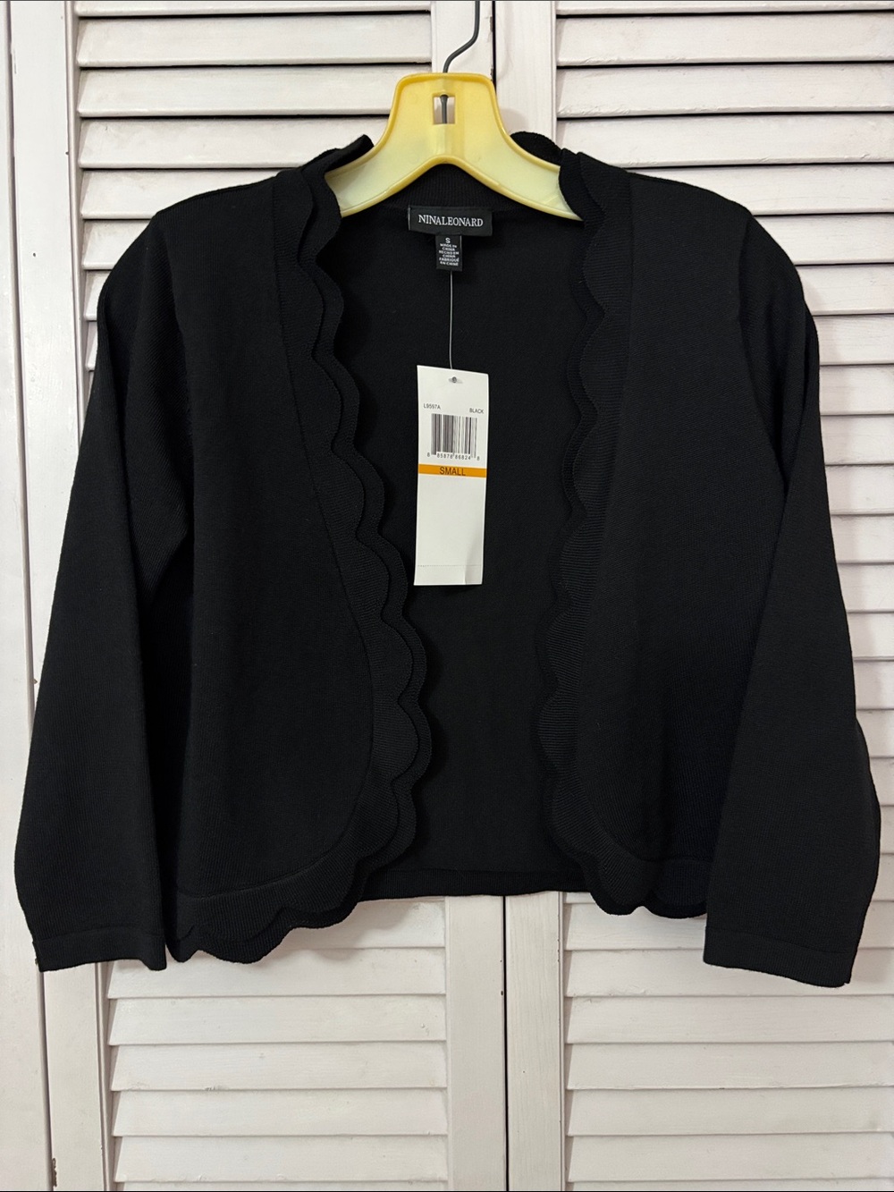 Nina Leonard Shrug
